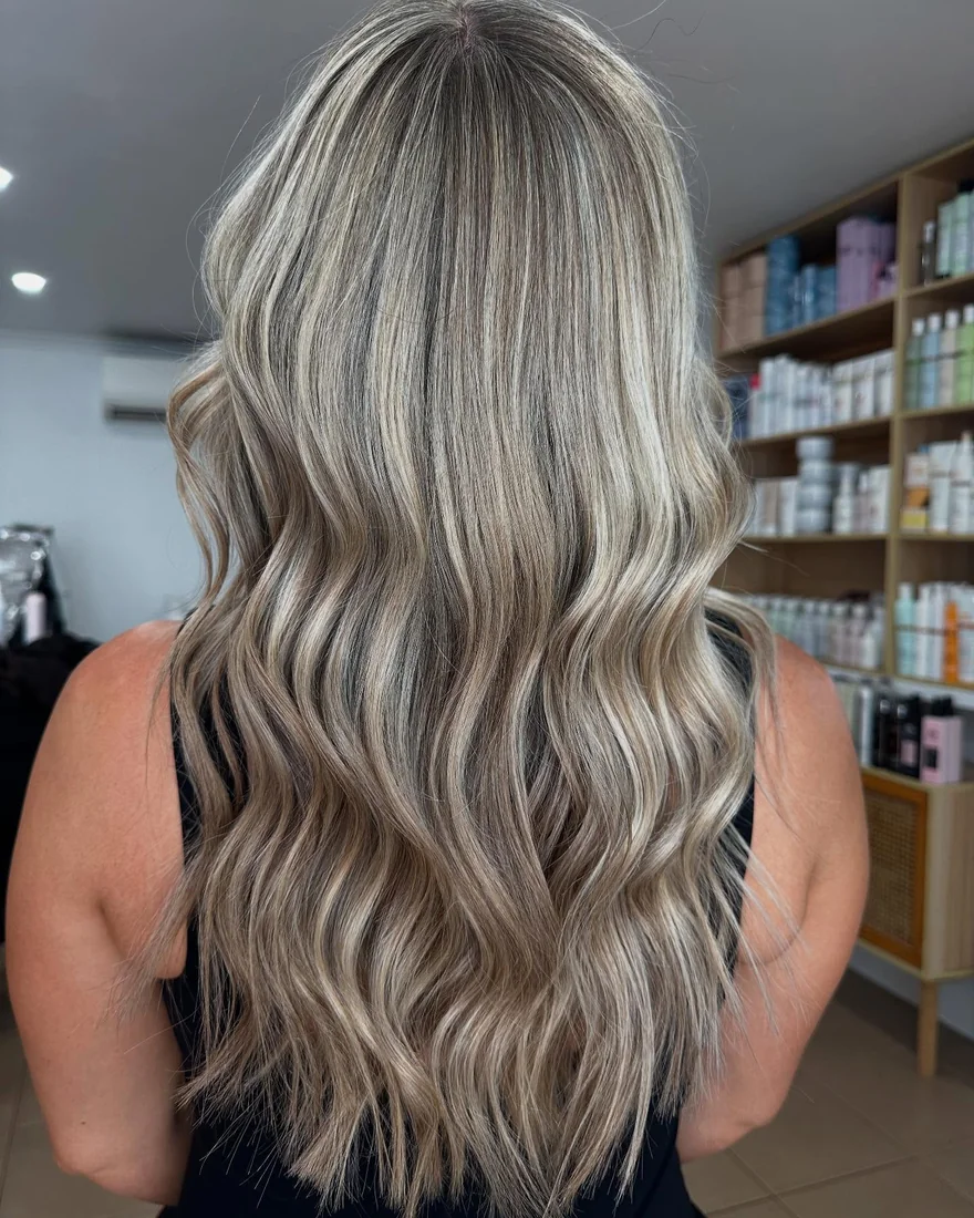 Beautiful blonde waves styled by Kate Bonnie Hair South Hedland