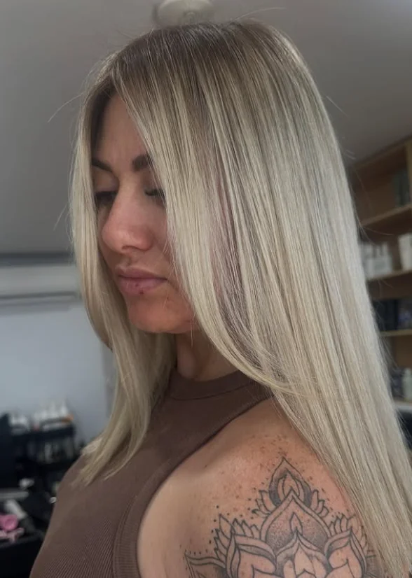 Sleek platinum hair styling by Kate Bonnie Hair South Hedland